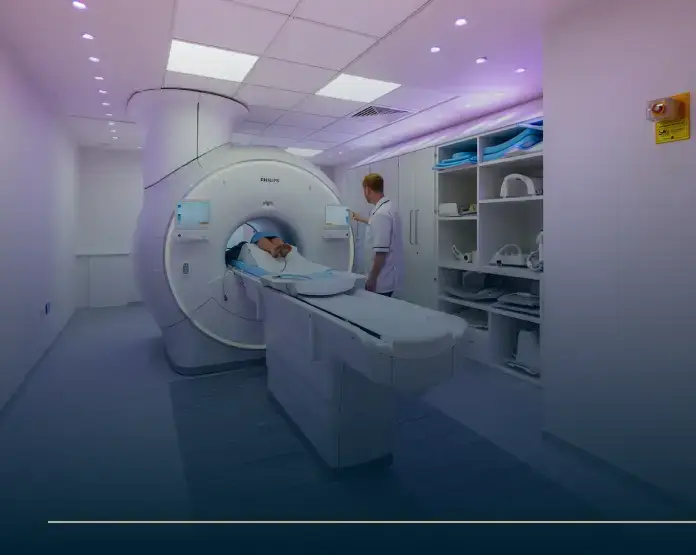 Patient undergoing MRI scan in a modern diagnostic room as part of corporate healthcare services