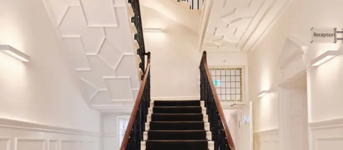 Elegant staircase interior at lumen harley street clinic - health assessment london